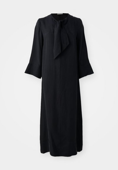 Black midi dress with a stand collar and a bowtie detail, long sleeves, and a relaxed fit, made from a smooth fabric with a matte finish.