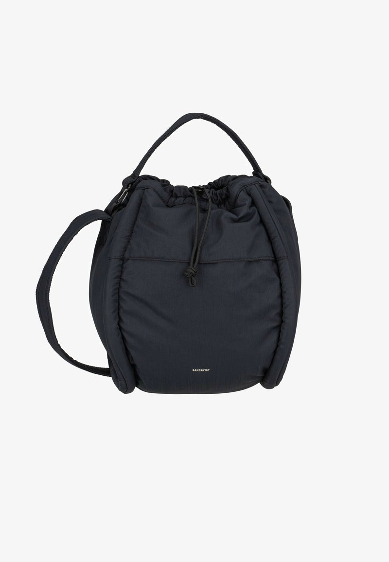 Black drawstring bucket bag with padded sides, top handle, shoulder strap, and small Sandqvist logo on front.