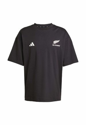Tshirt noir à manches courtes en coton. Présente le logo blanc "All Blacks" et des rayures Adidas sur la poitrine gauche. Coupe décontractée et col rond.