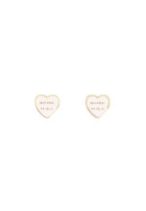 Gold heart-shaped earrings featuring the text "BIMBA Y LOLA" embossed in a contrasting color on a smooth, polished surface.