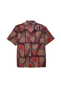 Chemise à manches courtes avec un motif géométrique rouge, marron et noir. Tissu léger avec un fermeture à boutons et un col.