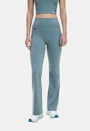 On, STUDIO FLARED PANTS 30" - Legging (type pantalon) - agave