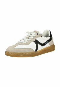 Sneakers low-top in crema, bianco e nero realizzati in materiali scamosciati e in pelle. Caratterizzati da una suola in gomma e un design laterale prominente.