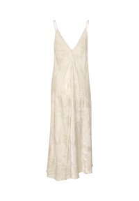 Cream slip dress with thin spaghetti straps, V-neckline, and subtle shiny textured pattern on flowing fabric.