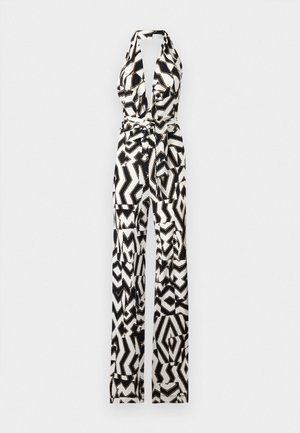 Sorte og hvide mønstrede jumpsuit med halterneck-design, som har brede ben og en bælte i taljen for ekstra form og detaljer.