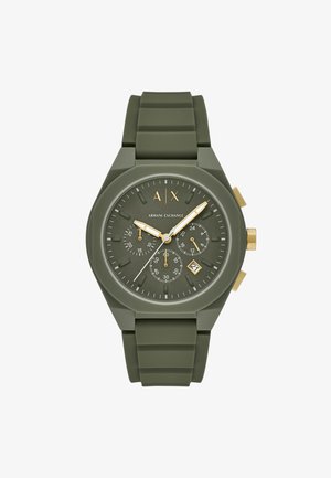 Grøn silikoneur med mat finish, gyldne accenter, chronograf underlader og en datovindue. Uret har et struktureret gummirem.