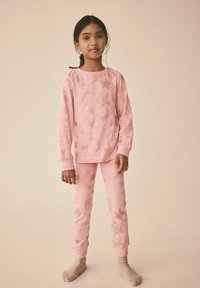 Rosanes Baumwoll-Pyjama-Set mit langärmligem Oberteil und enganliegenden Hosen, verziert mit goldenen Sternen- und Mondmustern. Weicher, bequemer Stoff.