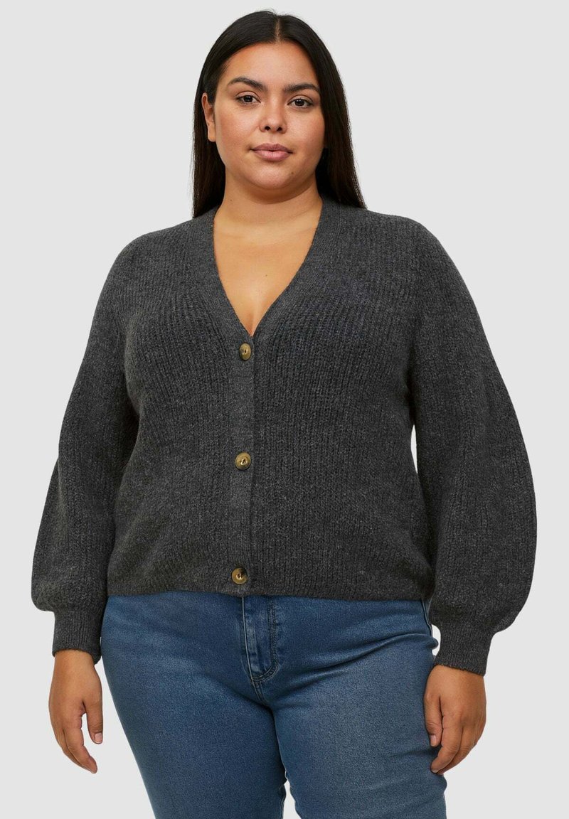 Cardigan grigio lavorato a maglia con scollo a V, apertura frontale e grandi bottoni. Presenta maniche a palloncino e tessuto testurizzato.