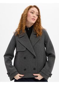 Grijze peacoat van een wollen mix, met een dubbelzijdige sluiting, grote revers en knoopmanchetten. Getailleerd ontwerp met een gestructureerde vorm.