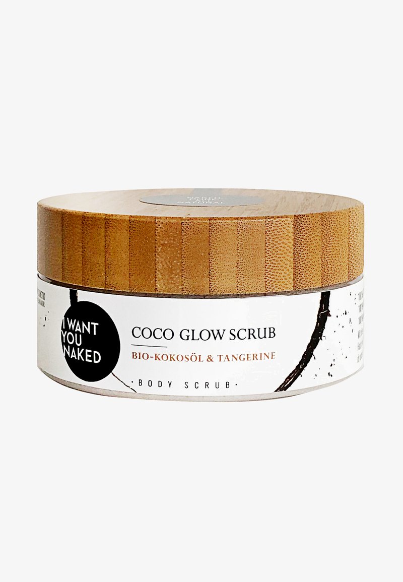 Okrągły pojemnik na peeling do ciała z teksturowaną drewnianą pokrywką. Biała etykieta z czarnym tekstem i akcentami. Nazwa produktu: Coco Glow Scrub.