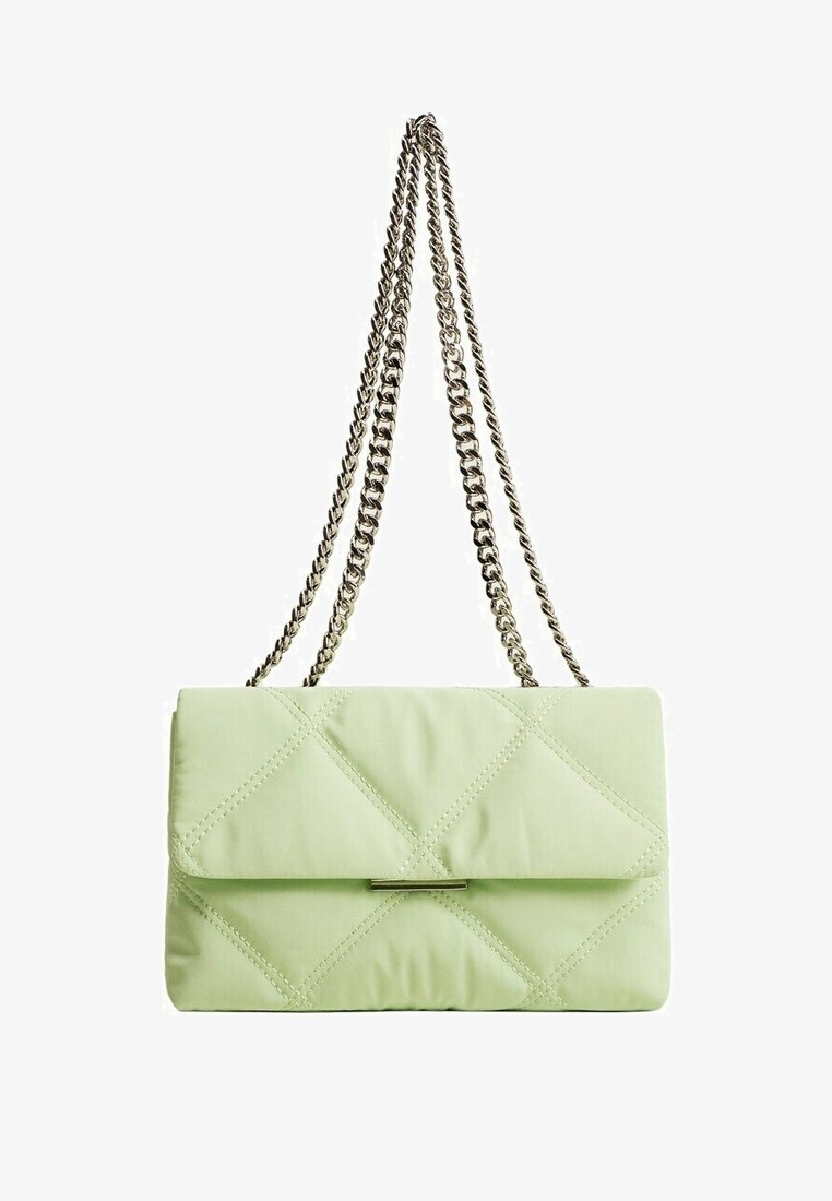 Light green quilted handbag with a flap closure, silver chain strap, and diagonal stitching pattern. Soft fabric texture.