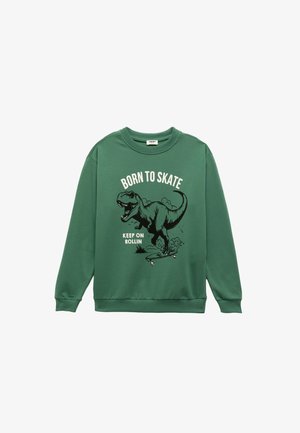 Zielona bluza z bawełny z grafiką dinozaura oraz napisem "Born to Skate" i "Keep on Rollin" w czerni i bieli.