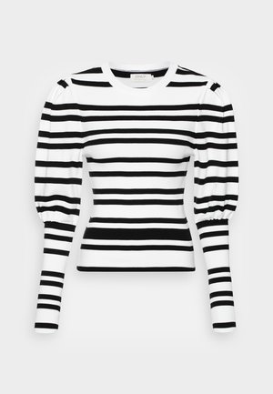 Mustat ja valkoiset raidalliset pitkähihainen paita, jossa on puffattuja olkapäitä, kuvioitu pinta ja istuva siluetti. Pyöreä kaula-aukko ja kontrastiväriset raidat koko paita.