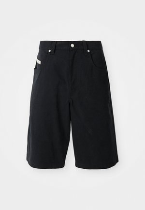 Zwarte katoenen shorts met een relaxte pasvorm, voorzien van zijzakken, een tailleband met riemlussen en een klein label aan de zijkant.