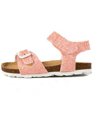 Sandales glitters roses avec deux sangles ajustables, semelle en liège et semelle en caoutchouc blanc. Le dessus texturé ajoute un intérêt visuel.