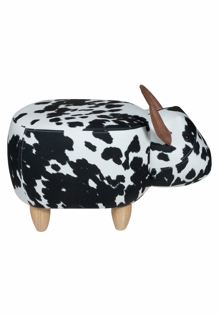 Kuhförmiger Pouf aus weißem Stoff mit schwarzen Flecken, mit Holzbeinen und ohren aus braunem Stoff. Abgerundetes Design, weiche Textur und Reißverschluss.