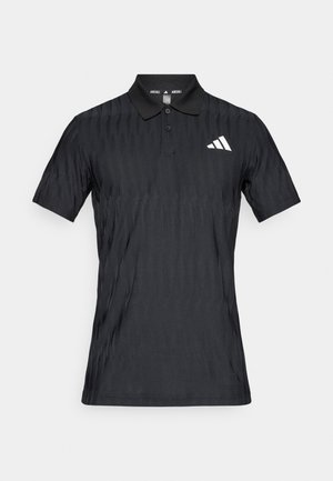 Black polo shirt made of breathable fabric, featuring a textured pattern, classic collar, and a white logo on the left chest.