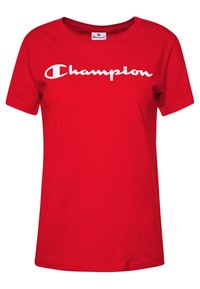 Rød bomulds t-shirt med et hvidt "Champion" logo på brystet. Korte ærmer og crew neck design. Glat tekstur, afslappet pasform.