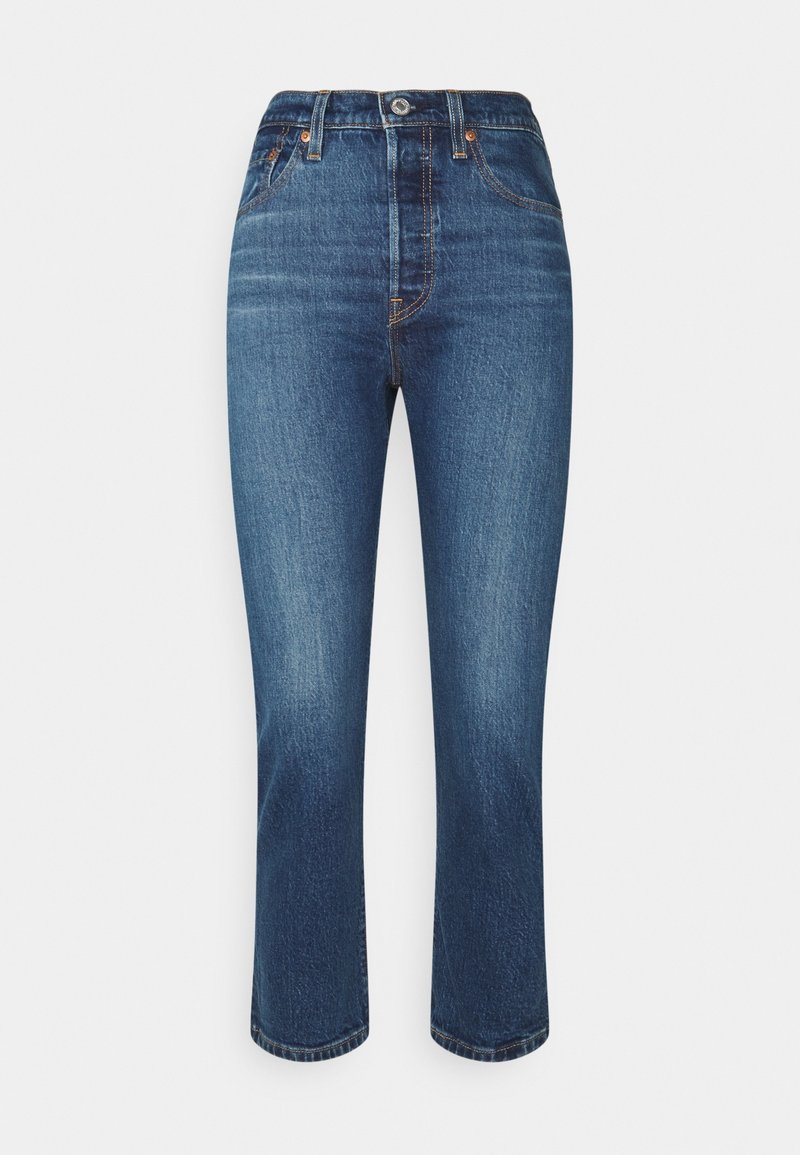 Jean en denim bleu taille haute avec jambes droites, fermeture éclair et bouton à l'avant, et style cinq poches.