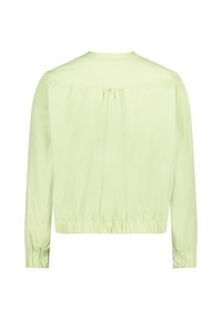 Veste légère à manches longues vert clair avec détail froncé sur le yoke arrière et poignets et ourlet élastiqués, vue de dos sur fond blanc.