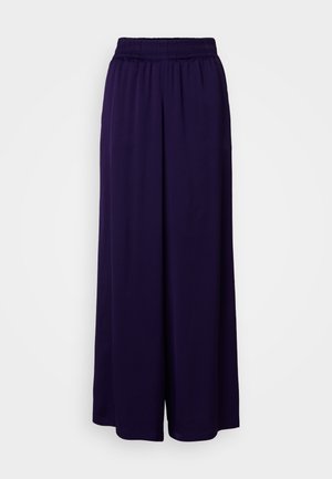 Lila, weit geschnittene Hose mit elastischem Bund. Weicher Stoff mit glatter Textur. Bodendeckendes Design, geeignet für lässige Anlässe.