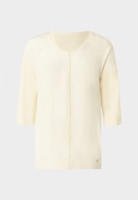 Bluză galben deschis cu mâneci scurte și decolteu în V, cu croială dreptă și un ușor luciu. Include un logo mic al brandului aproape de tiv.