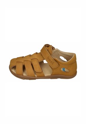 Brown leather children's sandal with adjustable velcro straps and open toe and heel for breathability and comfort.