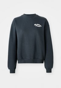 Mørkegrå hettegenser med lange ermer og rund hals. Har hvit brodering av "New Balance Athletics" på brystet. Myk tekstur.