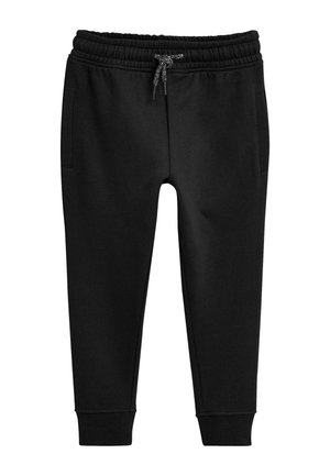 Pantalon de survêtement noir fuselé avec taille élastique, cordon réglable, poches latérales et chevilles bord-côtes.