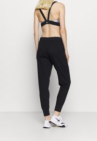 Nike Performance Trainingsbroek - black