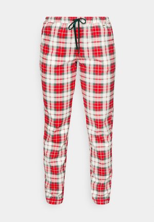 Rood-witte geruite broek met zwarte accenten, elastische tailleband en trekkoord. Lichtgewicht stof; taps toelopende pasvorm met naaddetails.