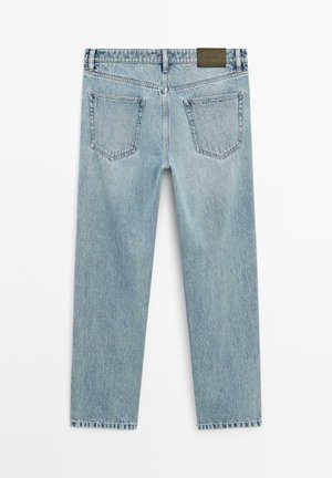 Light blue denim jeans with a straight-leg cut, featuring two back pockets and a leather logo patch on the waistband.