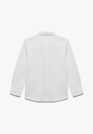 Witte langemouwen shirt van katoen, met een klassieke kraag, knopenmanchetten en een gebogen zoom. Soepele textuur zonder patronen.