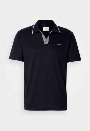 Polo de algodón de manga corta en color navy, con cuello a rayas y diseño de cuello en V, que incluye un pequeño logo en el pecho.