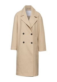Cappotto beige doppiopetto realizzato in morbido misto lana. Presenta ampie revers, due tasche frontali e bottoni neri. Vestibilità ampia con maniche a tre quarti.