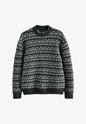 Sötétzöld kötött pulóver, ismétlődő fehér hópehely és hullám mintázattal. Kerek nyakkivágás, bordázott mandzsetták és alj. Puha tapintás.