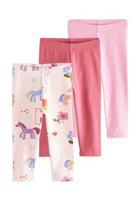 Drie paar kinderleggings: één met een patroon van eenhoorns en bloemen, één effen roze en één lichtroze met stippen.