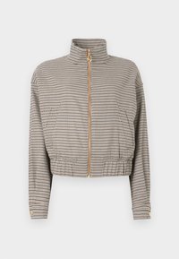 Κοντό μπουφάν με καρό μοτίβο, που διαθέτει ψηλό γιακά, χρυστό φερμουάρ και ελαστική γάμπα. Κατασκευασμένο από ελαφρύ ύφασμα με υφή.