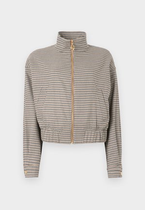 Κοντό μπουφάν με καρό μοτίβο, που διαθέτει ψηλό γιακά, χρυστό φερμουάρ και ελαστική γάμπα. Κατασκευασμένο από ελαφρύ ύφασμα με υφή.