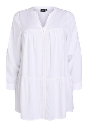 Tunique blanche à manches longues avec boutons sur le devant, coutures froncées sous les épaules et à la taille, dotée d'un col sans col et de manches retroussées.