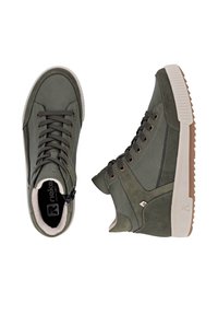 Green mid-top sneakers made of smooth leather and suede, featuring brown laces, a white sole, and a zipper detail on one side.