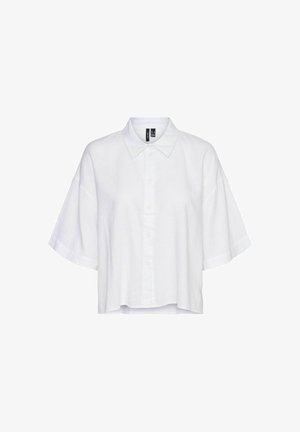 Valge lühikeste varrukatega nööbitav särk, mis on valmistatud linast. Omab teravat kraed, laia lõiget ja sirget hemmi ilma nähtavate mustrite või kaunistusteta.