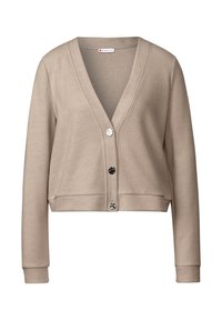 Beige kort cardigan med V-ringning, långa ärmar och fyra svarta knappar fram. Tillverkad av mjukt, slätt tyg.