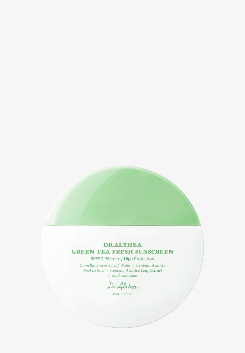 Contenant rond vert et blanc de Dr. Althea Green Tea Fresh Sunscreen avec SPF50 PA++++ et ingrédients à base d'extraits naturels.