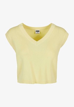 Kollane ribaga lühikeste varrukatega V-kaelusega särk, millel on lõdvestatud lõige. Valmistatud kergest kangast, millel on pehme tekstuur ja sirge alläär.