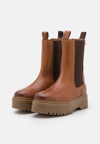 Copenhagen Shoes GOING - Botas de tornozelo com plataforma - cognac