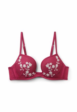Soutien-gorge rembourré rose vif avec bretelles réglables et broderie florale blanche sur les deux bonnets, posé à plat sur fond blanc.