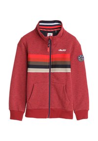 Rode ritsjack met horizontale strepen in tinten oranje, bruin en marineblauw. Heeft een hoge kraag, twee zakken aan de voorkant en geribbelde manchetten.