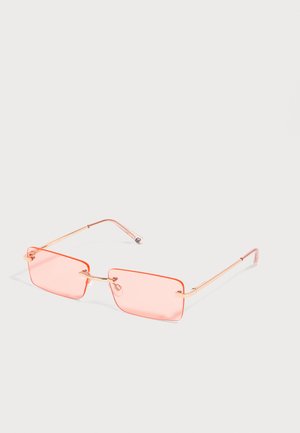 Rechteckige, rosa getönte randlose Sonnenbrille mit dünnen goldfarbenen Metallbügeln und verstellbaren Nasenpads auf einfachem hellem Hintergrund.