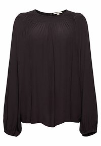 Blouse noire à manches longues avec un col rond, des détails froncés le long des épaules, et une coupe légèrement ample, fabriquée à partir d'un tissu doux.